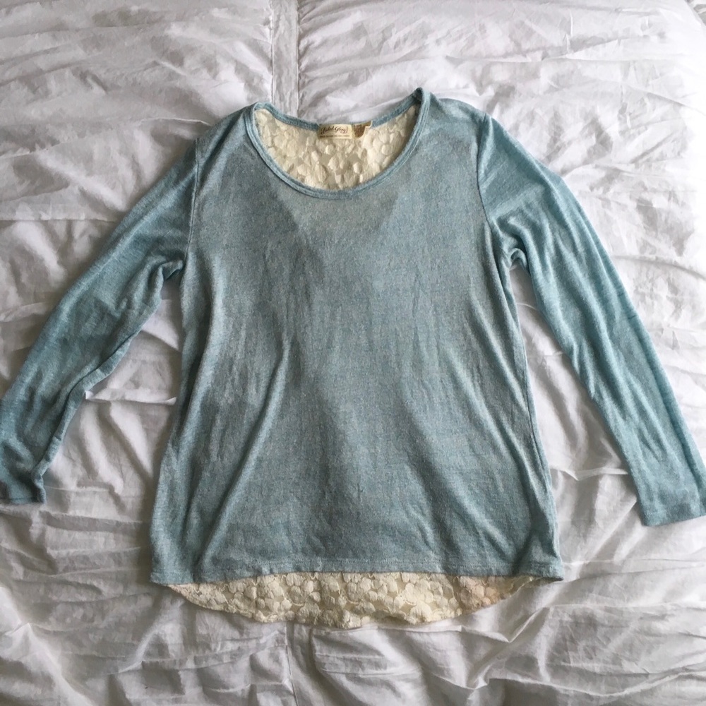 Long sleeve top with lace detail.